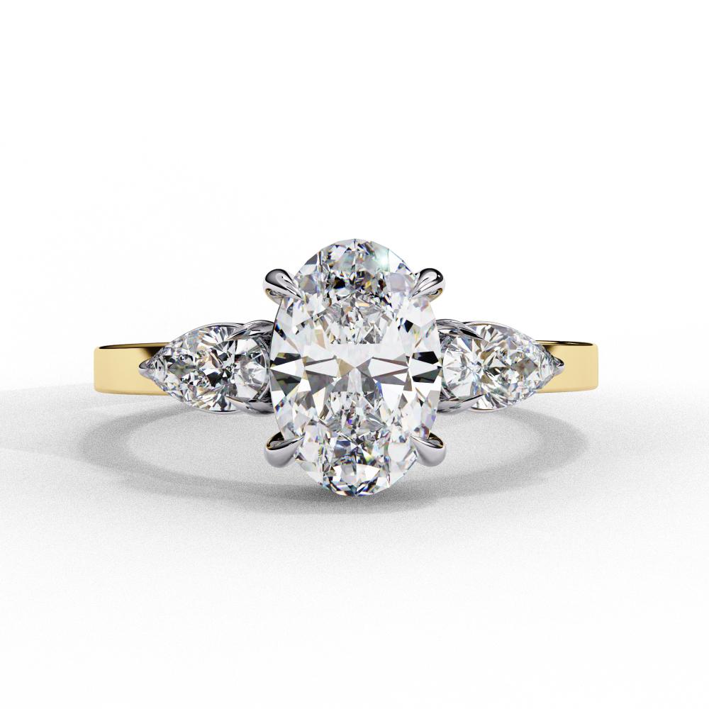 Oval Cut Three-Stone Diamond Ring with Pear Side Stones in Gold