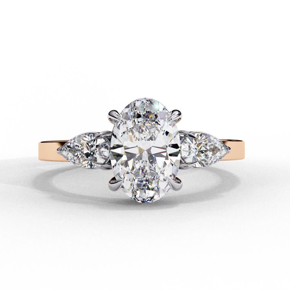 Oval Cut Three-Stone Diamond Ring with Pear Side Stones in Gold