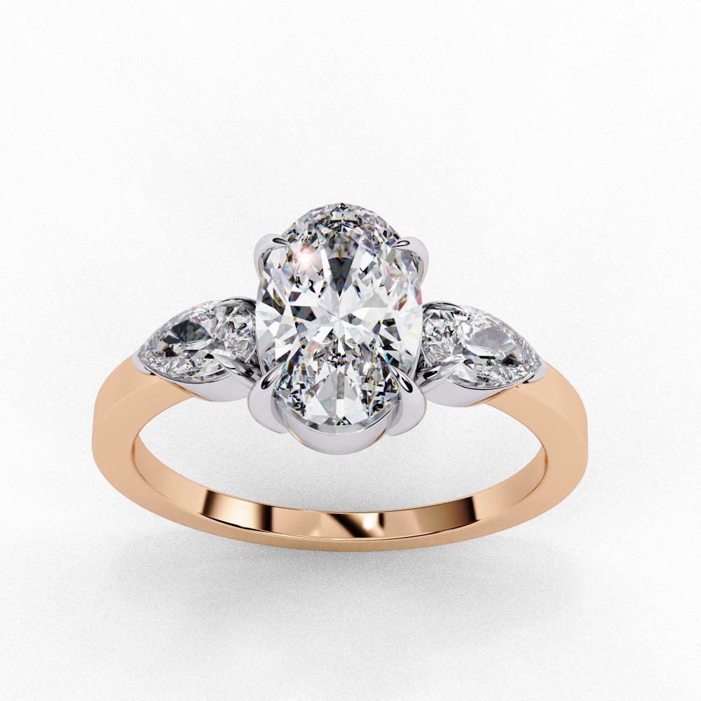 Oval Cut Three-Stone Diamond Ring with Pear Side Stones in Gold