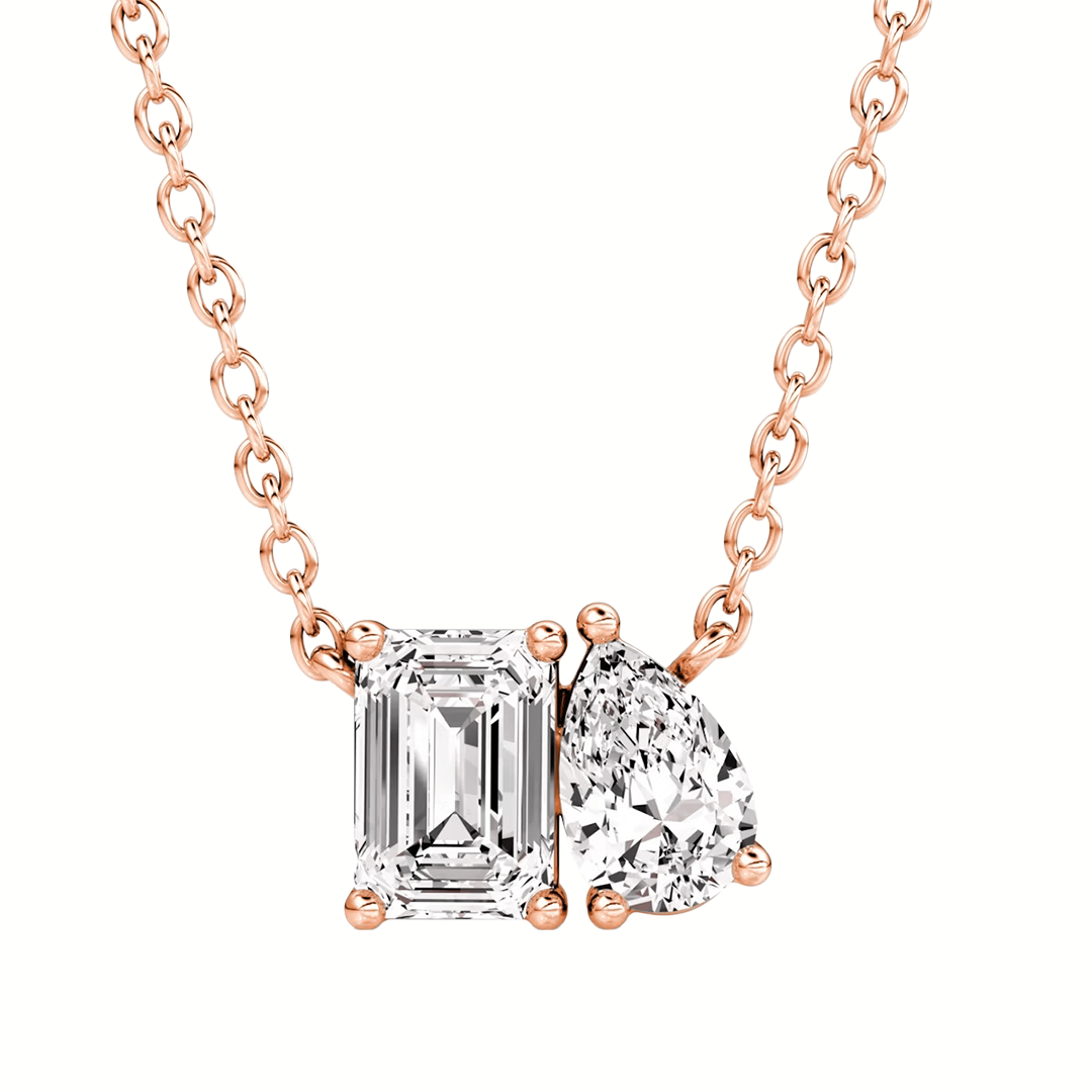 Toi et Moi diamond pendant in rose gold with emerald and pear cut