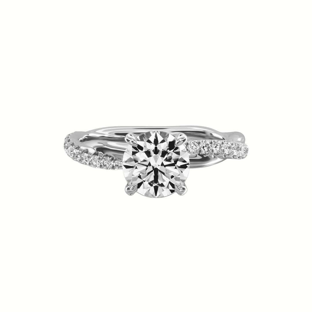 Round solitaire diamond ring with pavé twist band in white gold