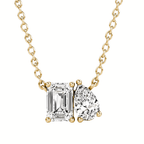 Toi et Moi diamond pendant in gold with emerald and pear cut