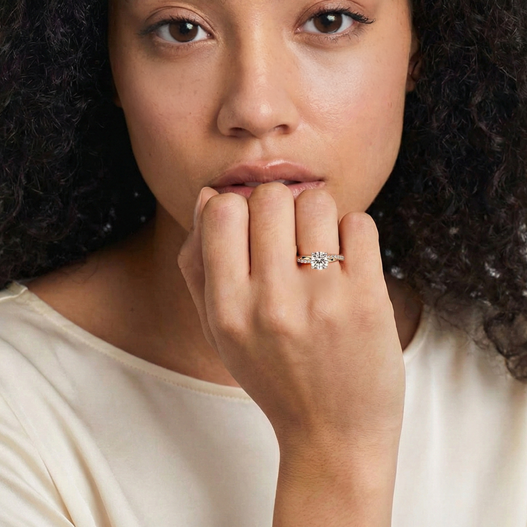Woman wearing Aesthetic twisted band diamond engagement ring