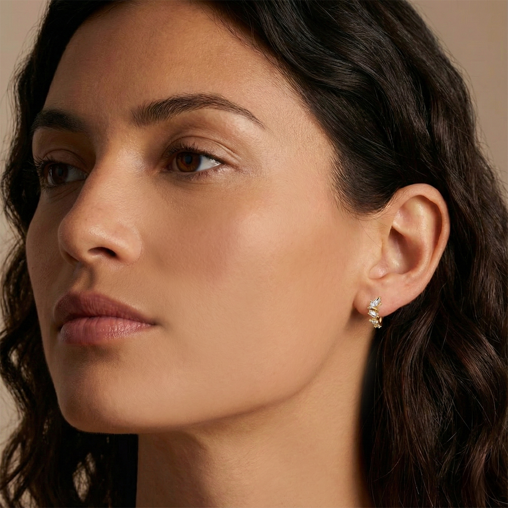 Woman wearing diamond hoop earring