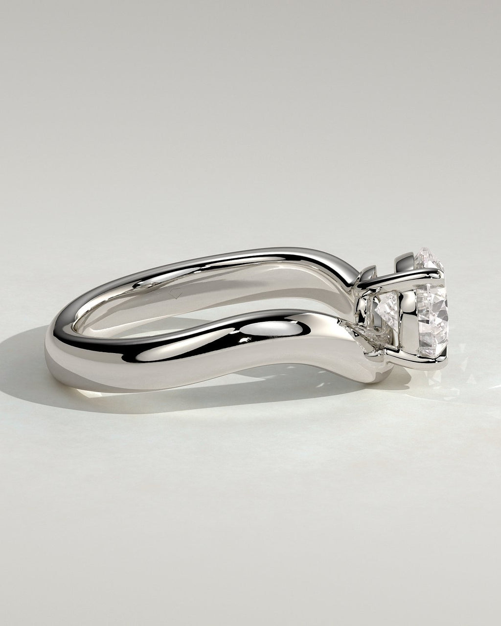 Pear Solitaire Bypass Engagement Ring in Gold