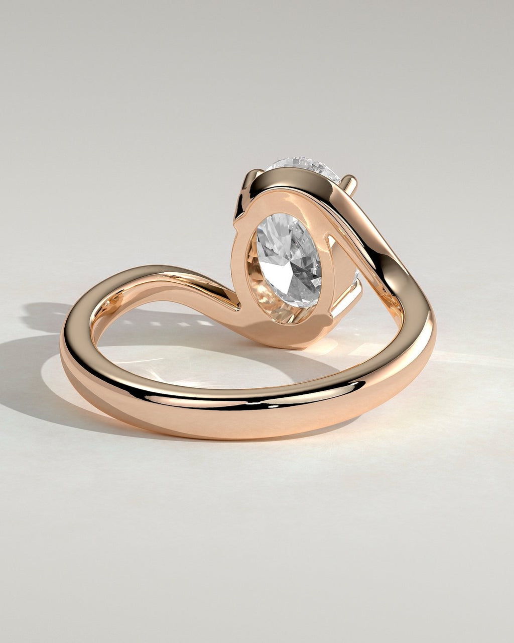 Oval Solitaire Bypass Engagement Ring in Gold