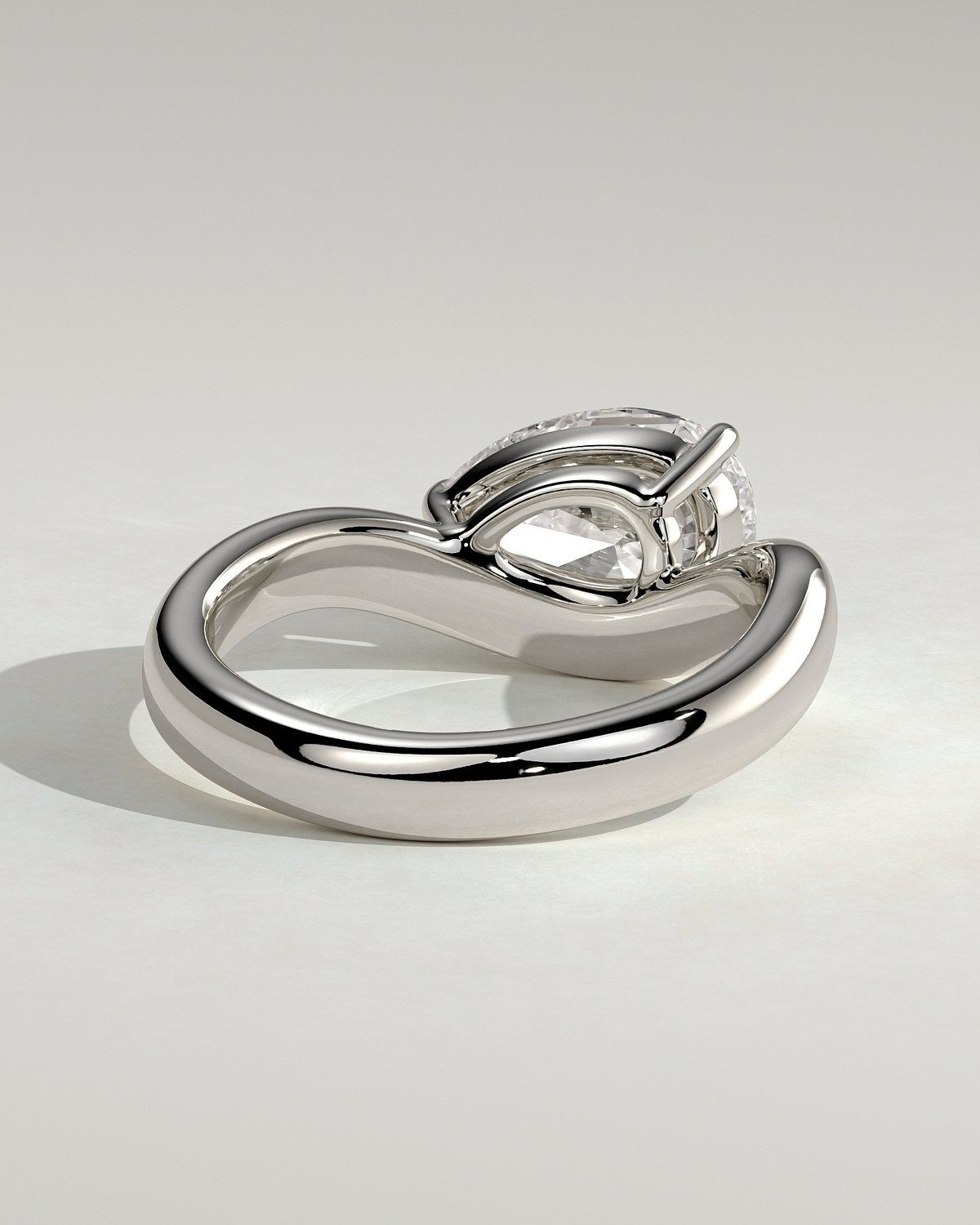 Pear Solitaire Bypass Engagement Ring in Gold