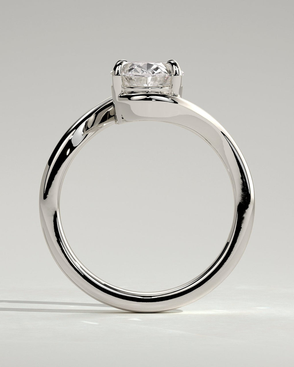 Oval Solitaire Bypass Engagement Ring in Gold