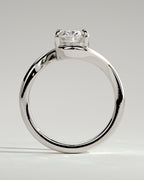 Oval Solitaire Bypass Engagement Ring in Gold