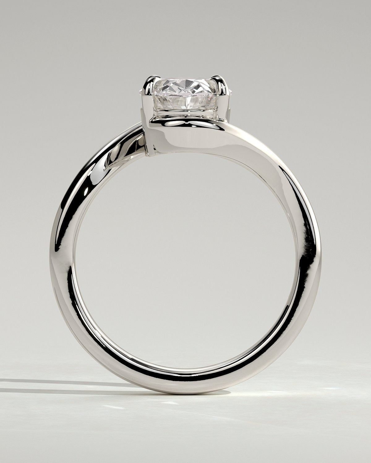 Oval Solitaire Bypass Engagement Ring in Gold