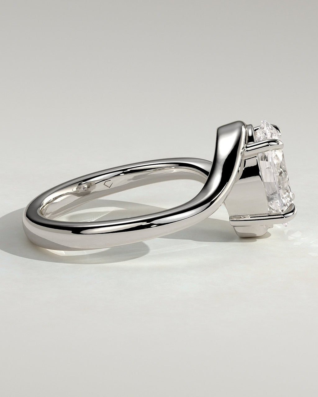 Oval Solitaire Bypass Engagement Ring in Gold