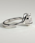 Oval Solitaire Bypass Engagement Ring in Gold