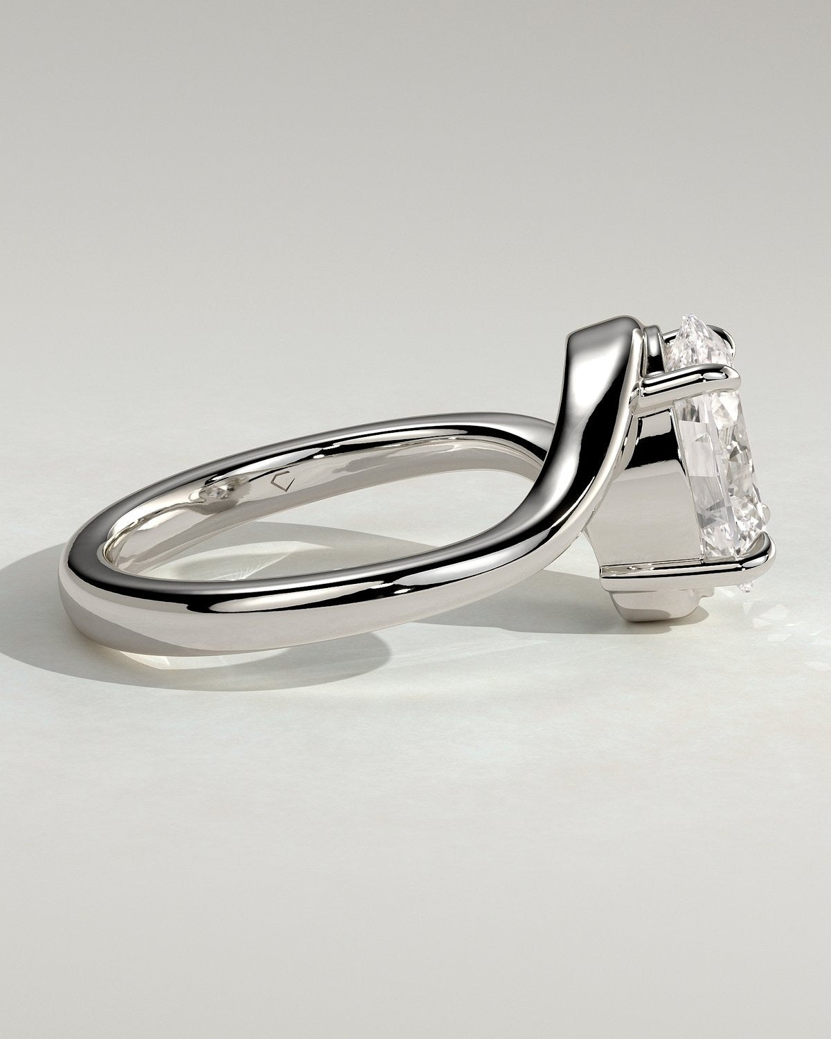 Oval Solitaire Bypass Engagement Ring in Gold