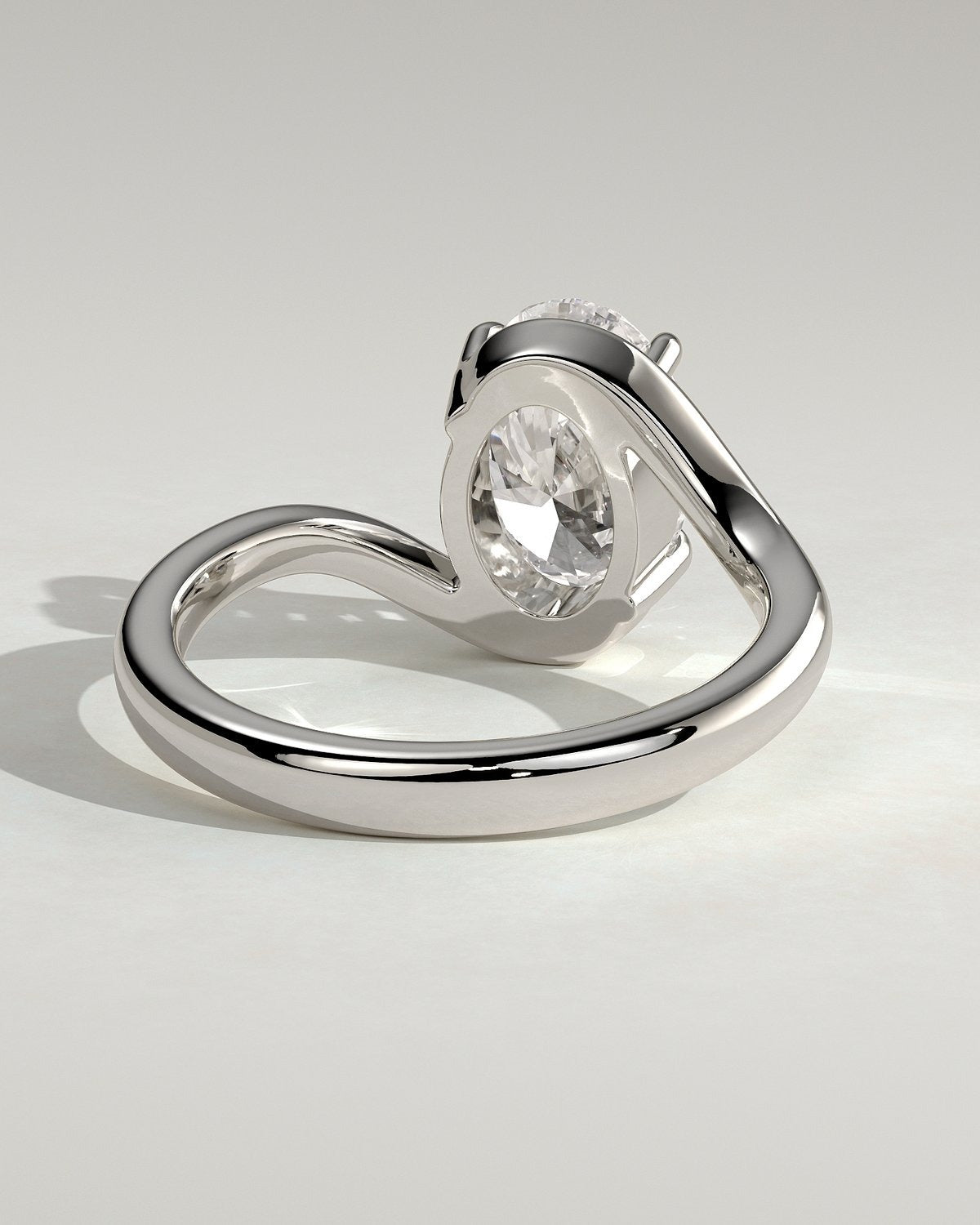 Oval Solitaire Bypass Engagement Ring in Gold