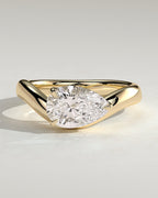 Pear Solitaire Bypass Engagement Ring in Gold