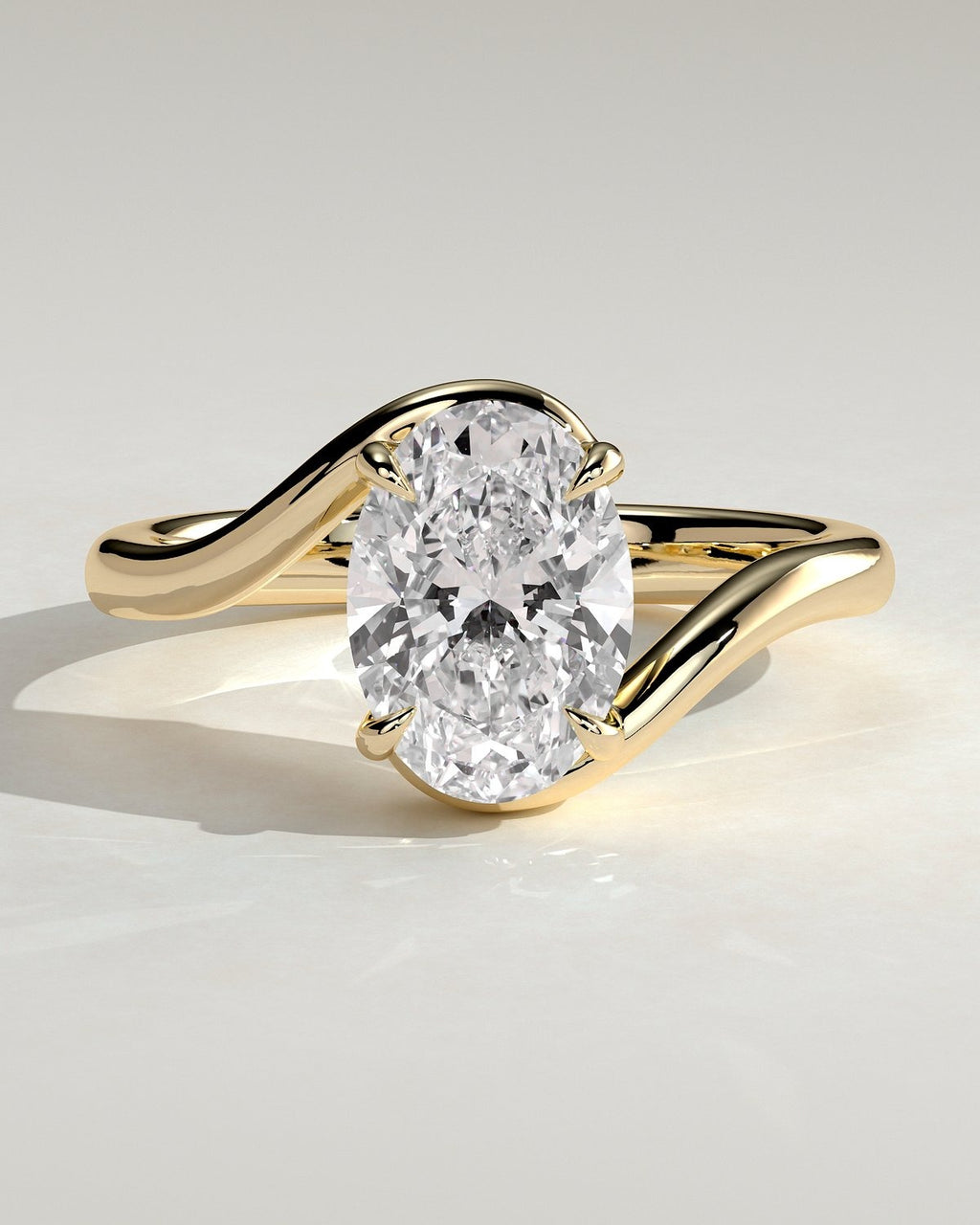 Oval Solitaire Bypass Engagement Ring in Gold
