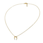 Gold necklace with a small pendant on a white background