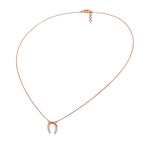 Rose gold necklace with a small pendant on a white background