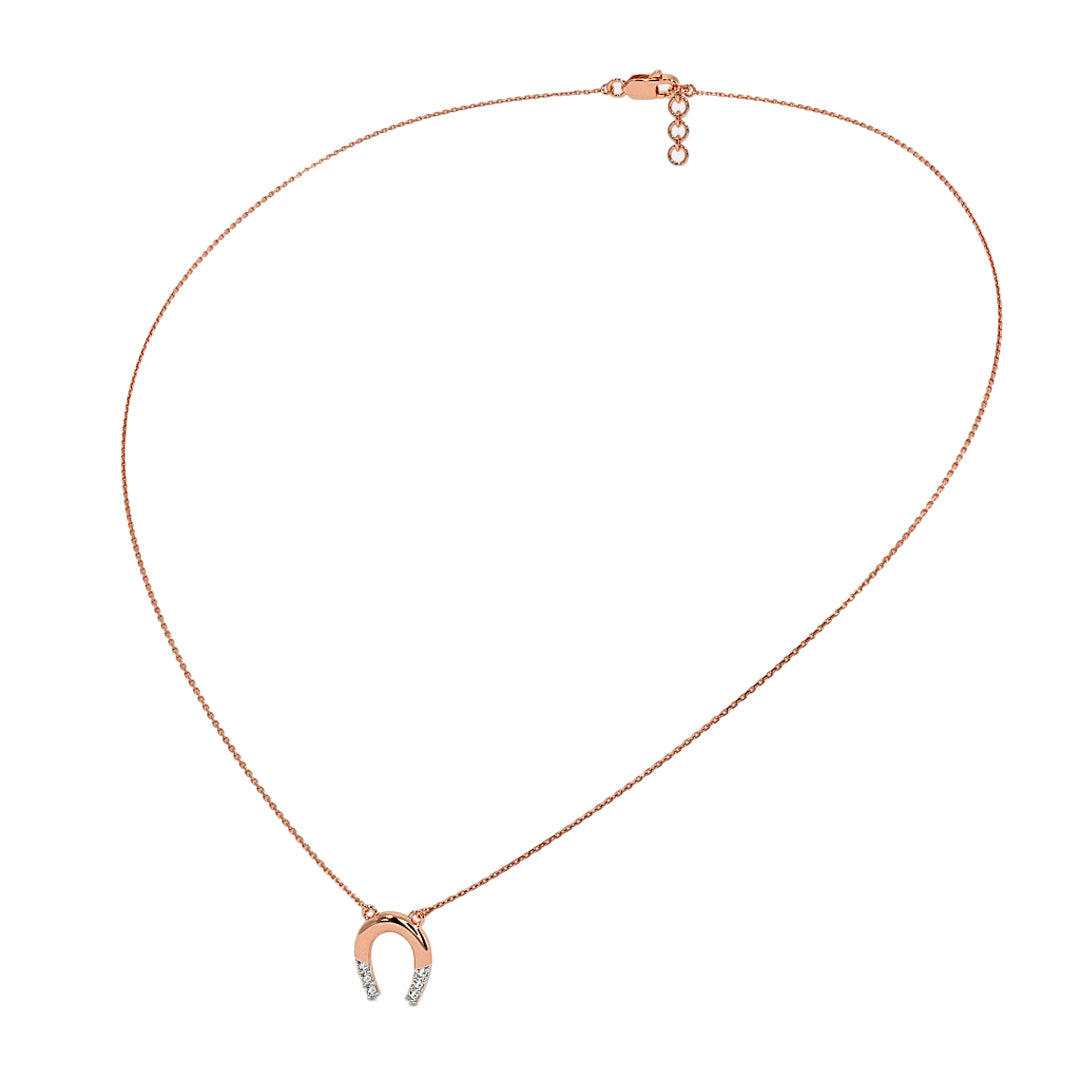 Rose gold necklace with a small pendant on a white background