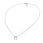 Silver necklace with a horseshoe pendant on a white background