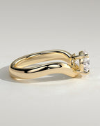 Pear Solitaire Bypass Engagement Ring in Gold