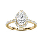 A yellow gold ring featuring a pear-cut diamond center stone surrounded by a halo of smaller round diamonds, with a pavé-set diamond band, shown on a clean white background.