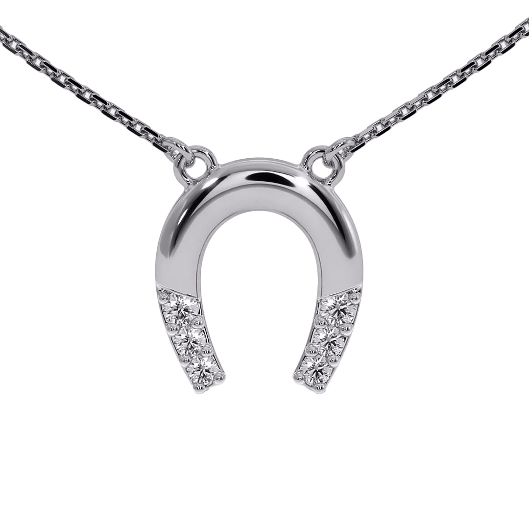 Silver horseshoe pendant necklace with diamonds on a white background