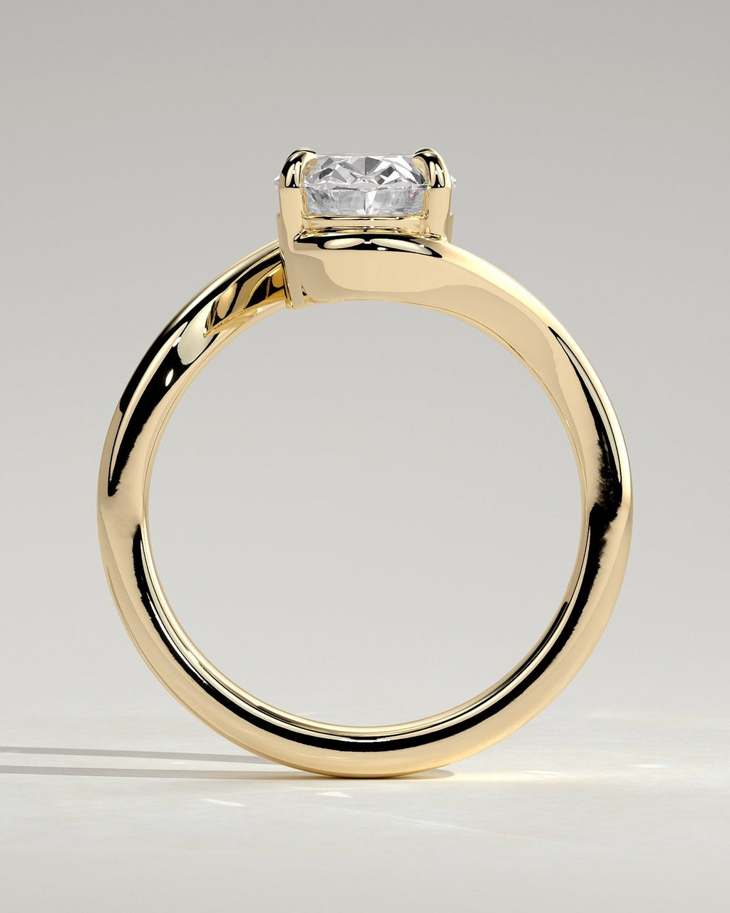 Oval Solitaire Bypass Engagement Ring in Gold