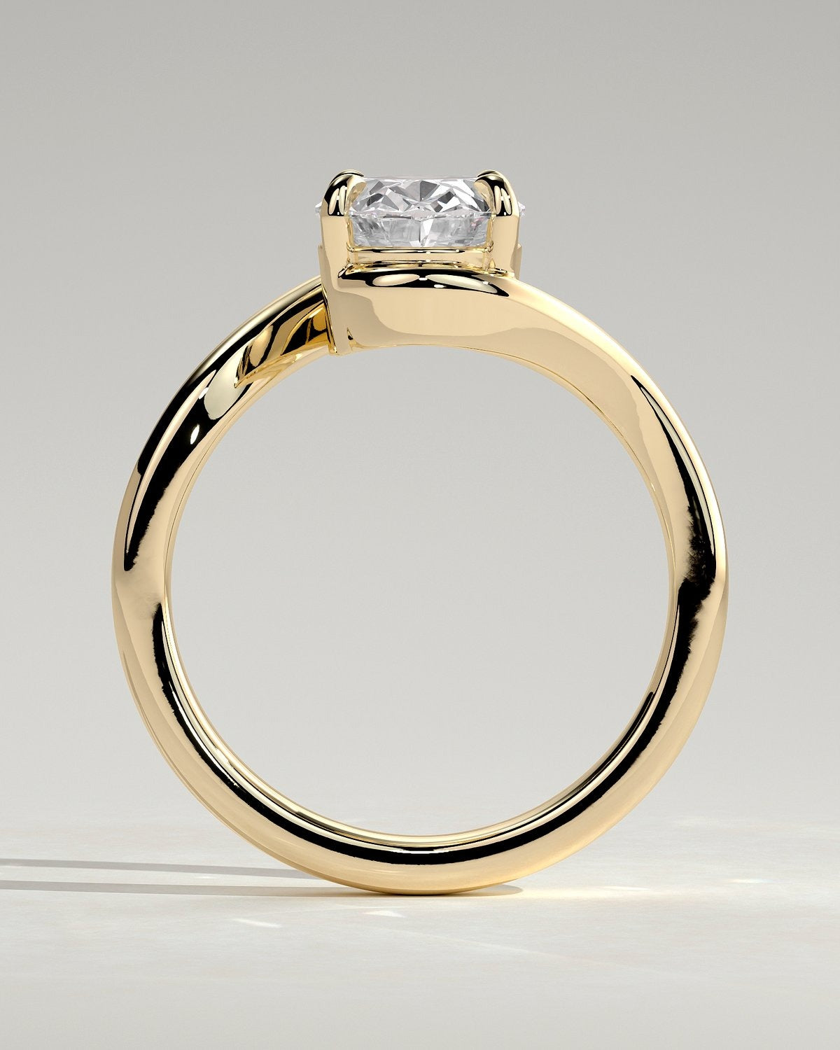 Oval Solitaire Bypass Engagement Ring in Gold