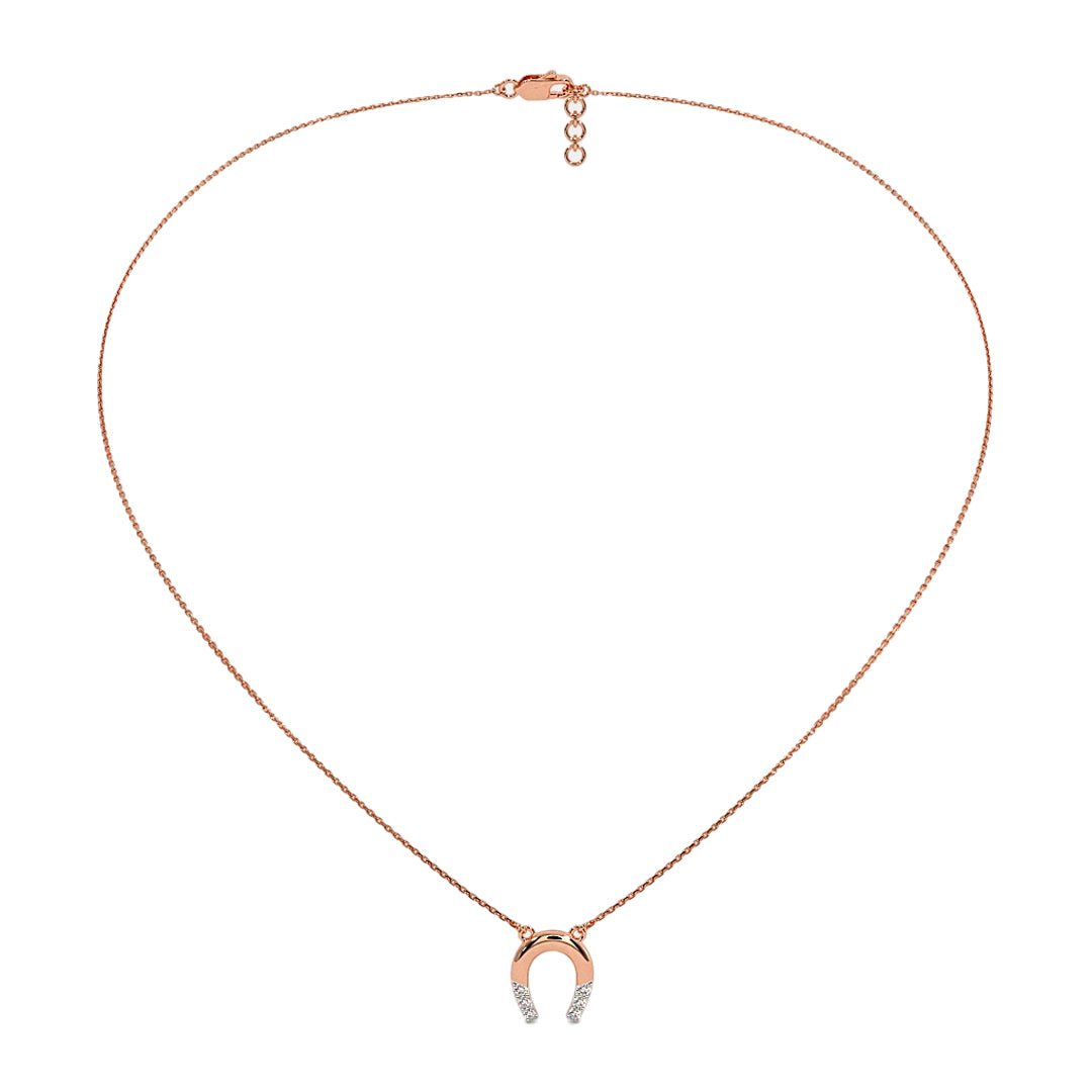 Rose gold necklace with a small pendant on a white background