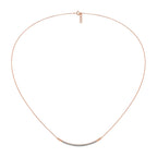 Rose gold diamond necklace on a white background