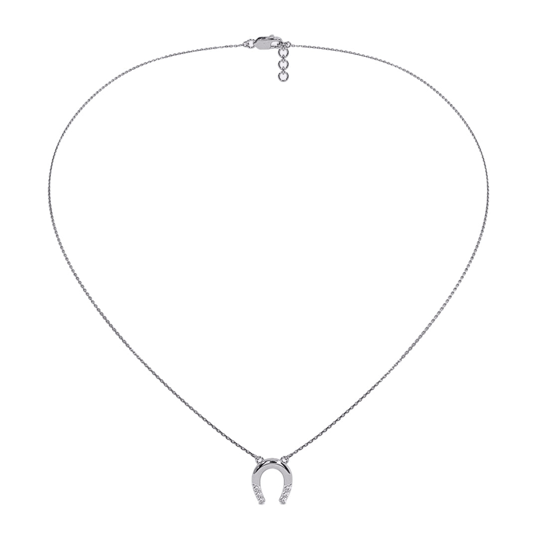 Silver necklace with a horseshoe diamond pendant on a white background