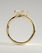 Pear Solitaire Bypass Engagement Ring in Gold