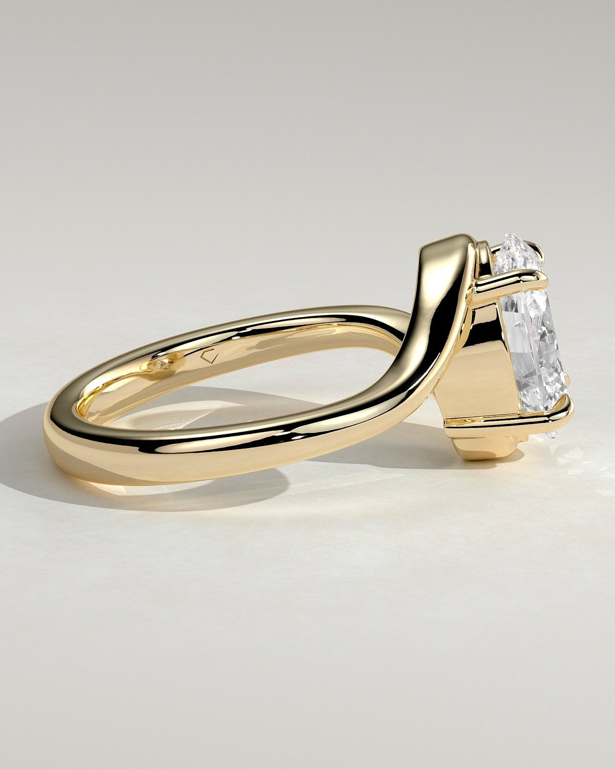 Oval Solitaire Bypass Engagement Ring in Gold