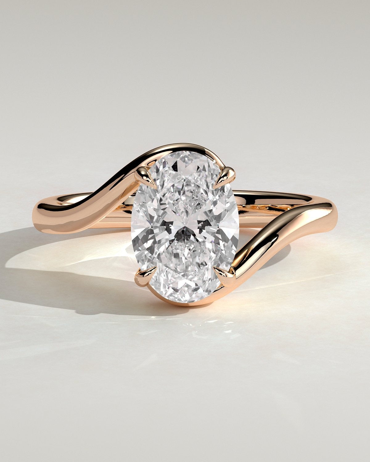 Oval Solitaire Bypass Engagement Ring in Gold