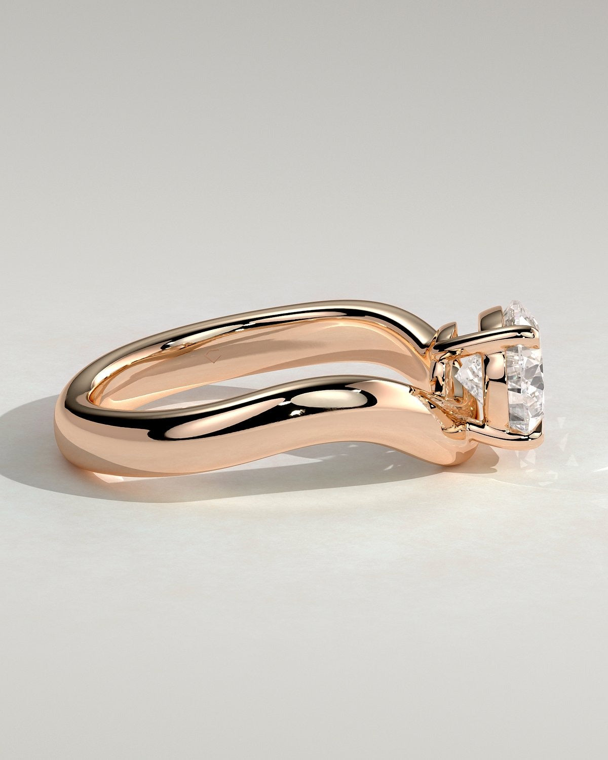 Pear Solitaire Bypass Engagement Ring in Gold