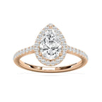 A pear-cut diamond halo ring in rose gold with pavé-set diamonds on the band, shown on a clean white background.