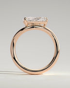 Pear Solitaire Bypass Engagement Ring in Gold