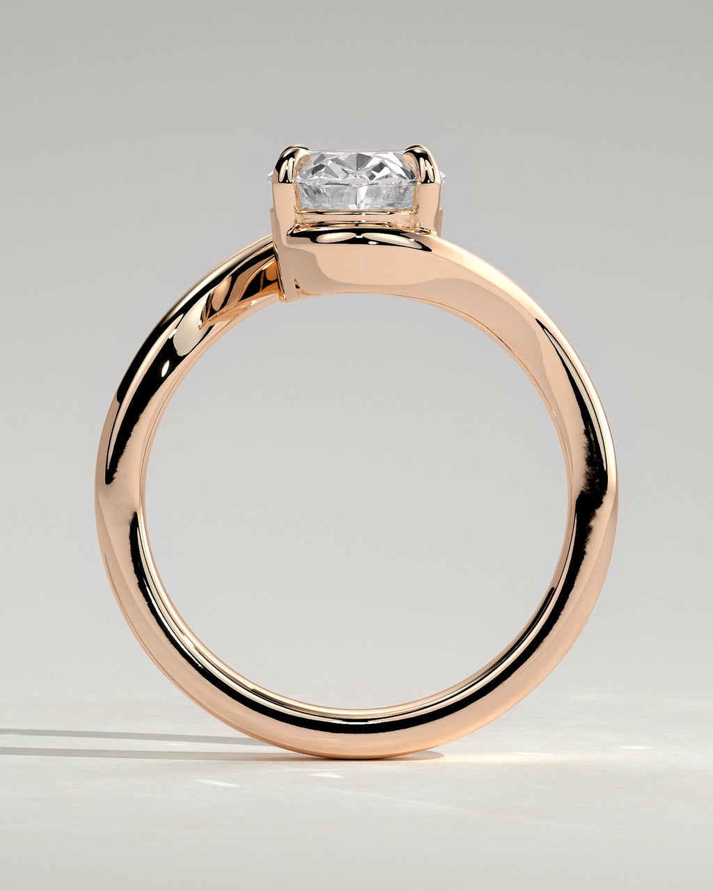 Oval Solitaire Bypass Engagement Ring in Gold