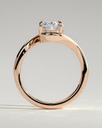 Oval Solitaire Bypass Engagement Ring in Gold