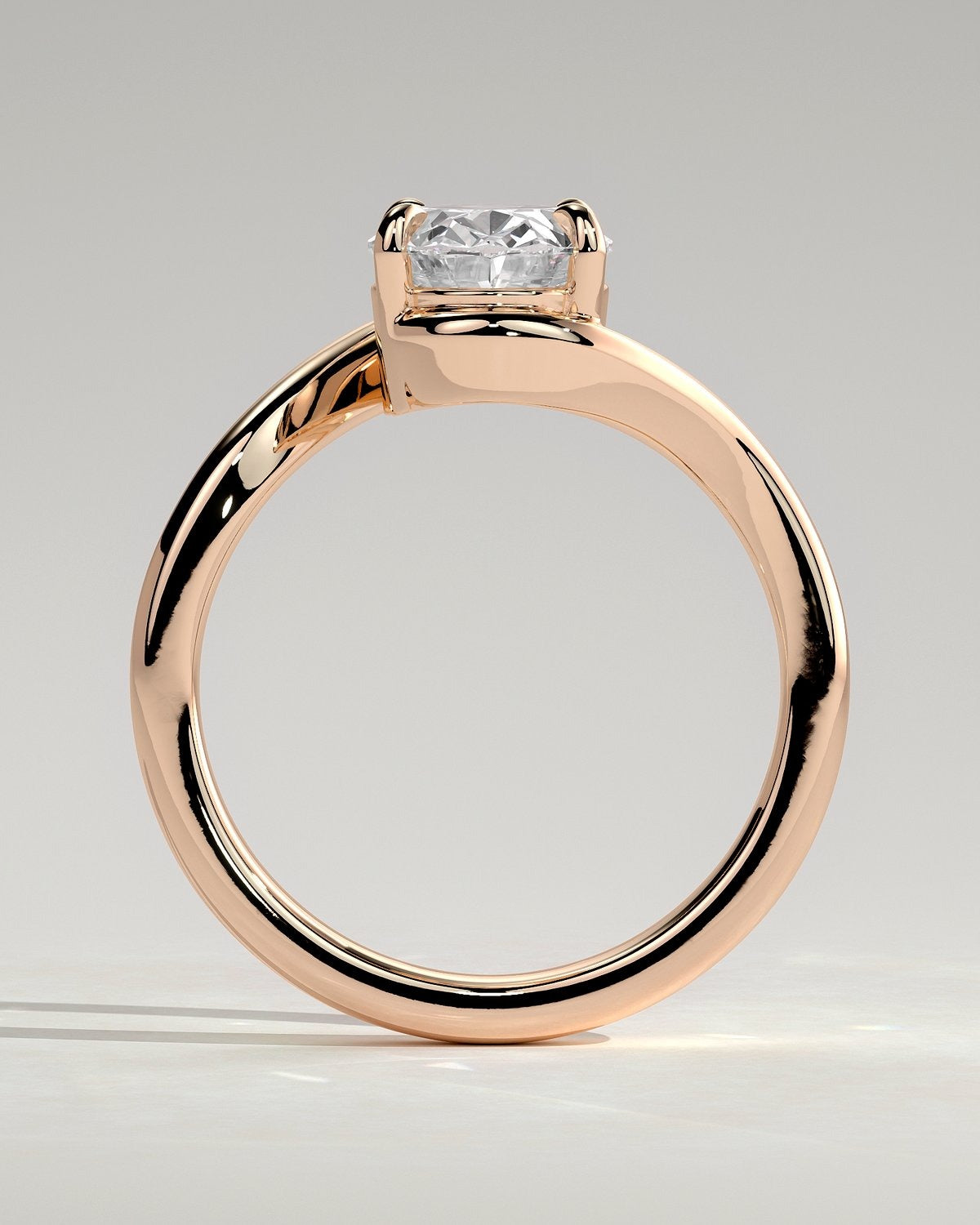 Oval Solitaire Bypass Engagement Ring in Gold