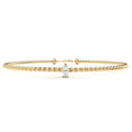 Twisted rope-pattern gold diamond bracelet with marquise diamond