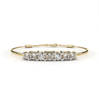 Gold diamond bracelet with round and princess cut stones