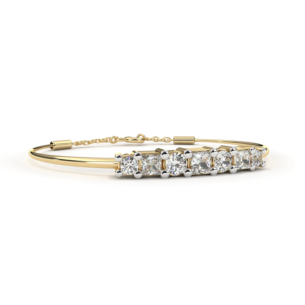 Gold bangle bracelet with two shape diamonds