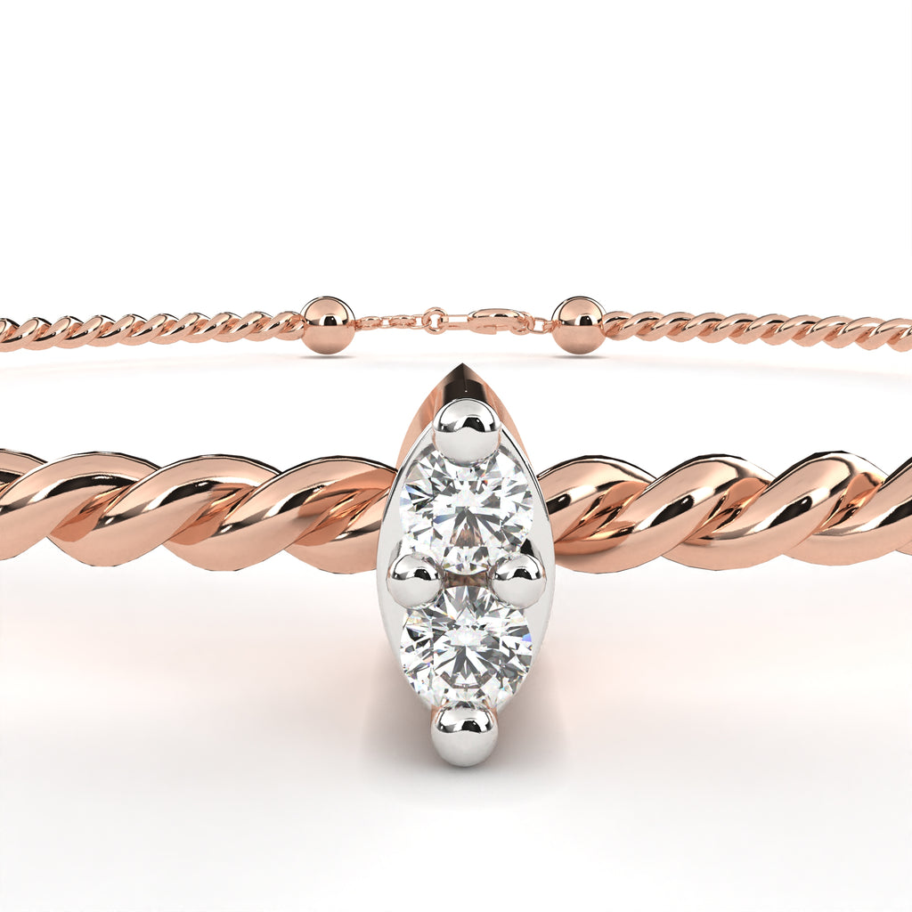 Rope-pattern rose gold bracelet with marquise-cut diamond