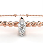 Rope-pattern rose gold bracelet with marquise-cut diamond