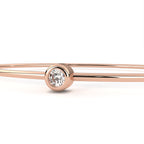 Minimal rose gold bangle with round diamond