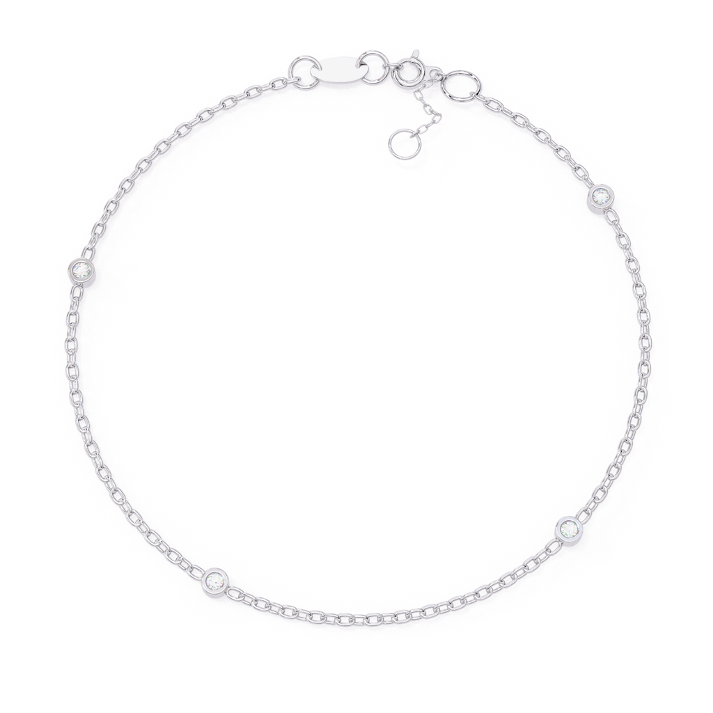 Dainty adjustable white gold diamond bracelet with bezel-set stones
