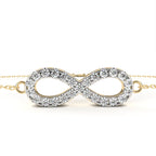 Gold bracelet with diamond infinity design