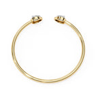 Gold cuff bracelet with pear-cut diamonds